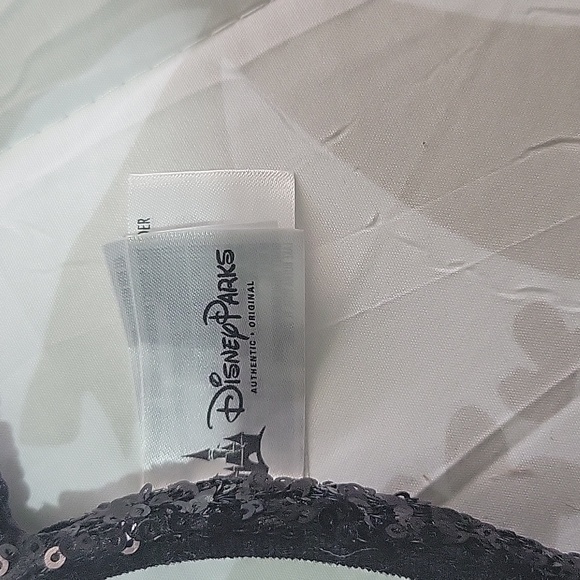Like new Disney Parks sequin Minnie Mouse ears. - Picture 2 of 2